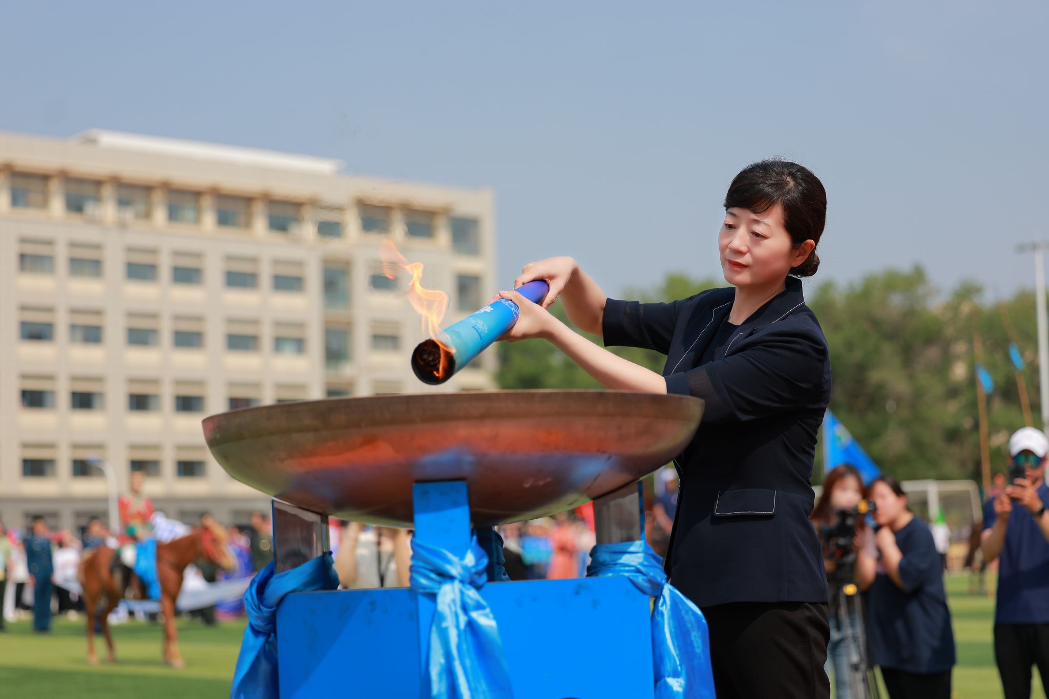 學校舉辦第十二屆校園那達慕文化節(jié)暨第六十一屆田徑運動會開幕式